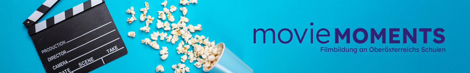 MOVIEMOMENTS Kinoszene Klappe und Popcorn